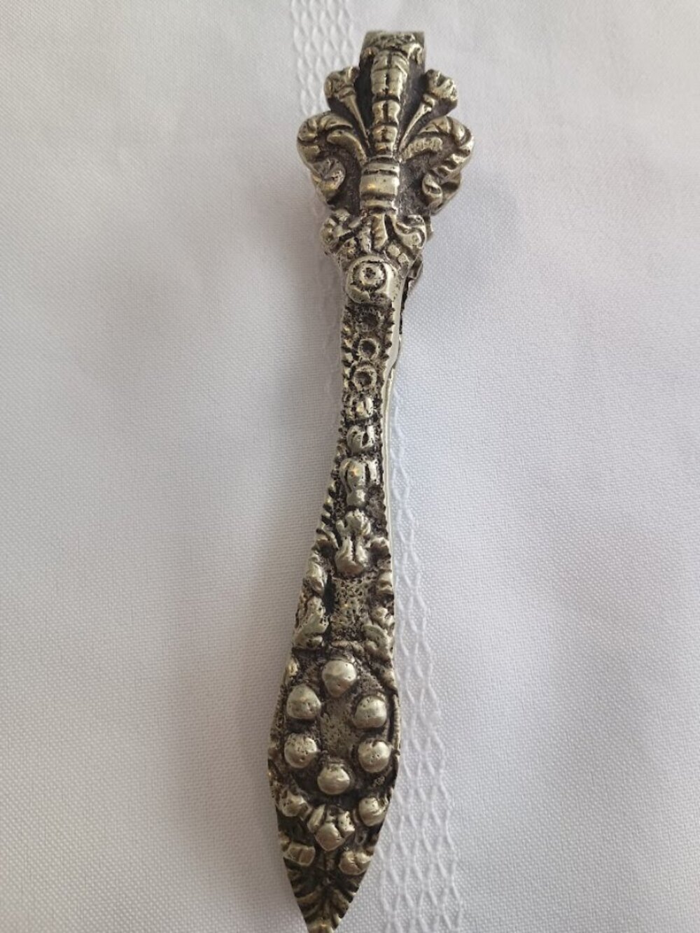 Vintage Brass Nutcracker with Ornate Design